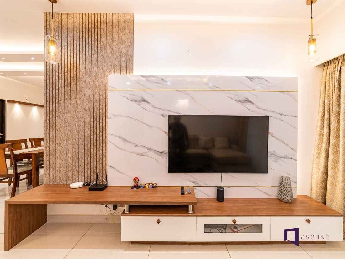 Marble-look TV wall with slatted divider and wood console
